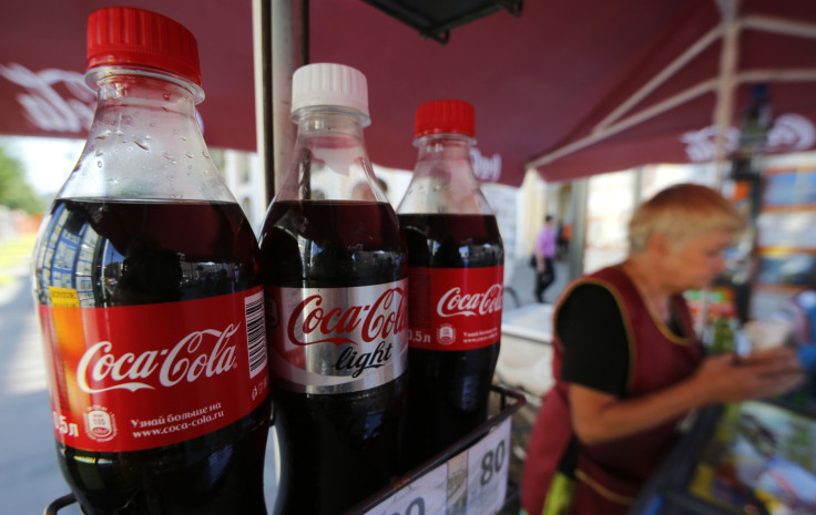 Coca-Cola bottles are seen on sale in central St. Petersburg, August 6, 2014. Coca-Cola Co confirmed on Wednesday it had taken advertisements off four Russian television channels