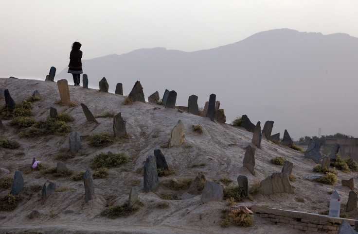 Child in a graveyard in rural pakistan (Getty Paula Bronstein)