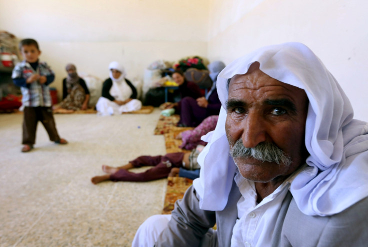 Yazidi families are fleeing the bloodshed and violence in the northern Iraqi town of Sinjar.