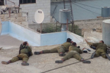 Amatuer Video shows Israeli Soldiers Celebrate Shooting Palestinian Teen