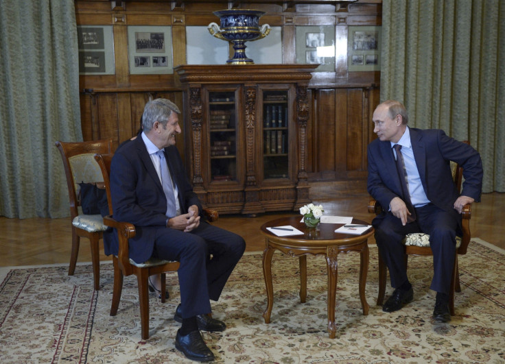 Russian President Vladimir Putin (R) meets with French businessman Philippe de Villiers in Yalta, Crimea,