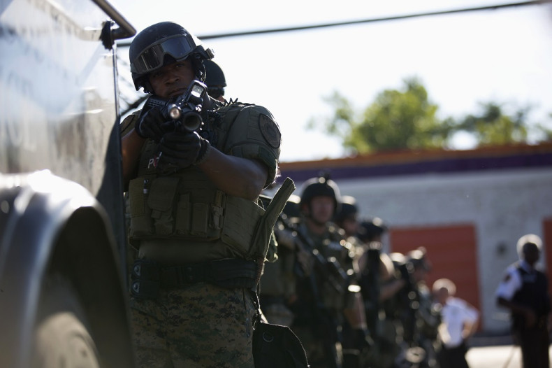 A Ferguson police officer in riot gear
