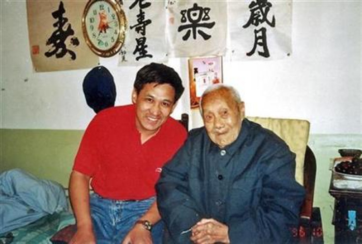 Jia Yinghua (L), the author of The Last Eunuch of China, poses with China's last eunuch, Sun Yaoting, at Sun's house in Beijing in a 1996 photo.