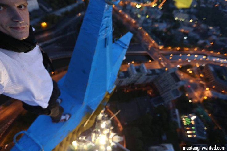 Picture posted on the facebook page of Mustang Wanted, after he painted the Soviet star atop a landmark Moscow building Ukrainian blue. (Facebook)