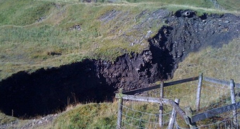 Fears are mounting that the 200ft-deep sinkhole in County Durham, northern England could get bigger with torrential downpours.