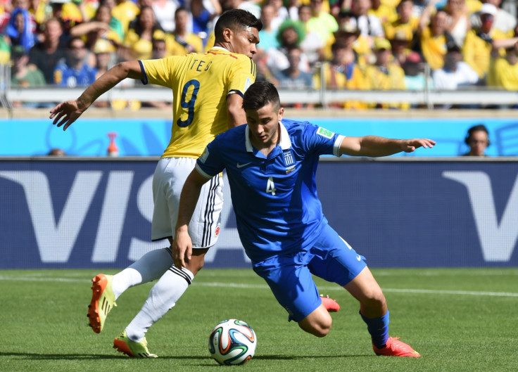 Teofilo Gutierrez in action against Greece's defender Konstantinos Manolas