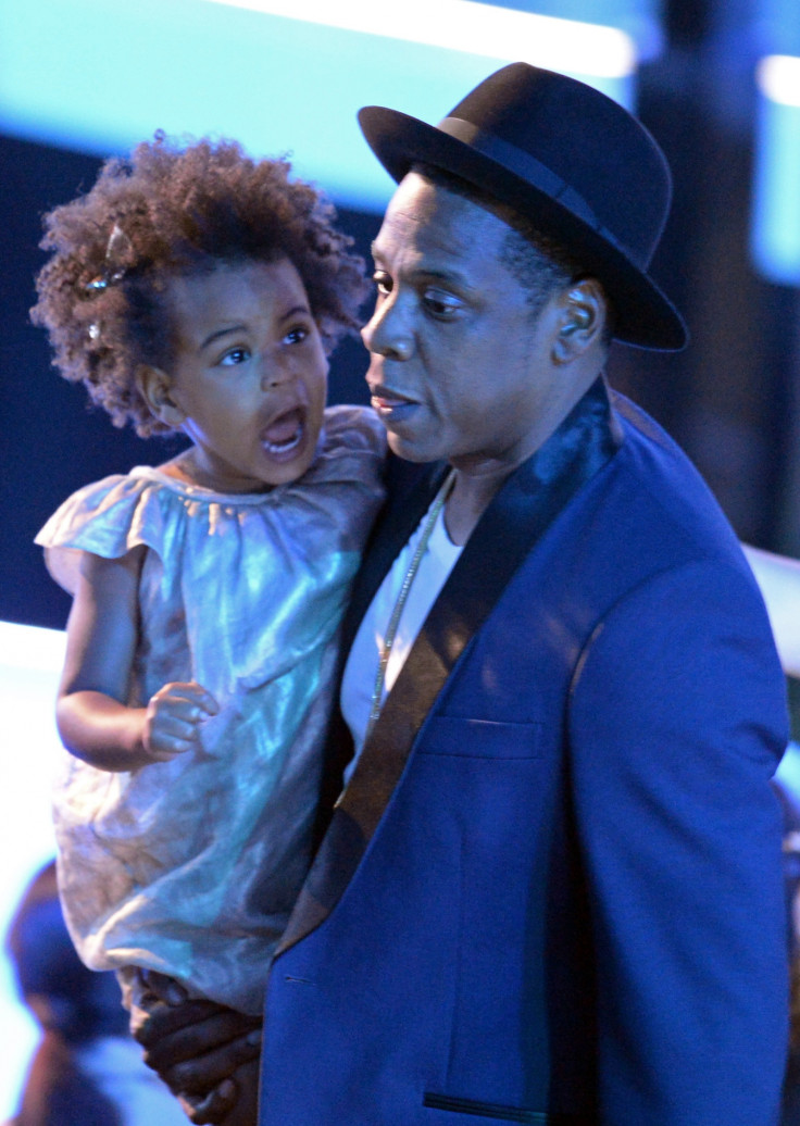 Blue Ivy Carter and Jay-Z on stage at the 2014 MTV VMAs