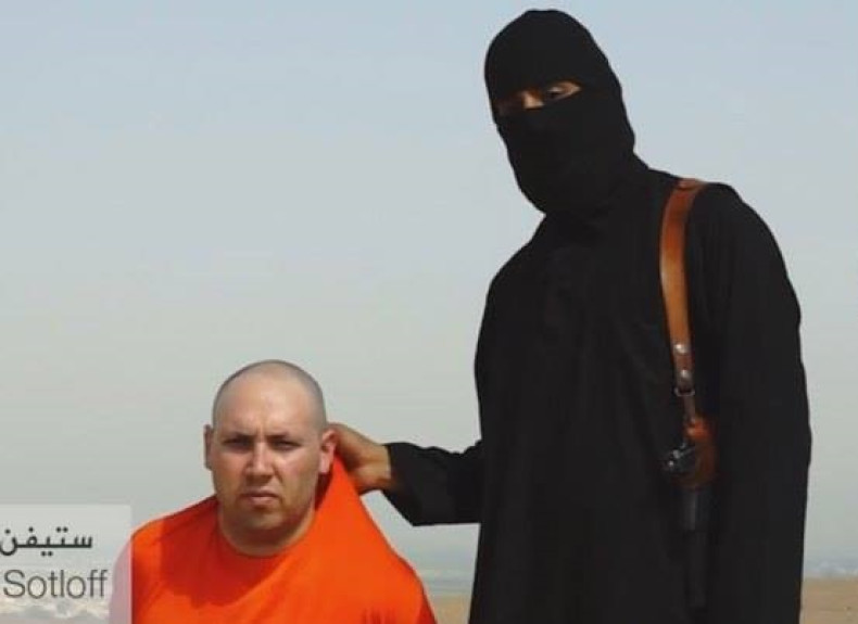 An IS thug grips Steven Sotloff by the collar in chilling video which featured threats to murder US reporter