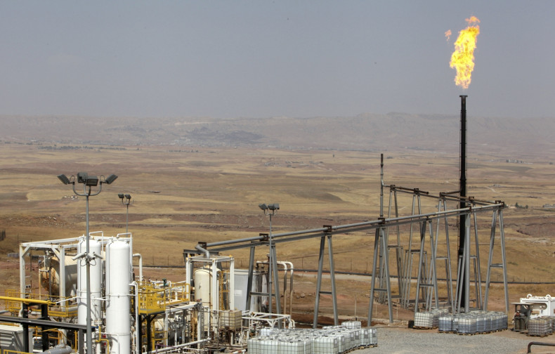 A flame rises from a chimney at Taq Taq oil field in Arbil, in Iraq's Kurdistan region