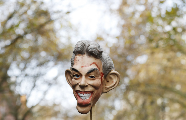 A mask of Tony Blair is held up on a stick at an anti-war rally to protest against a speech given by Blair at University College London's (UCL) new Institute for Security and Resilience Studies, in central London on November 13, 2012