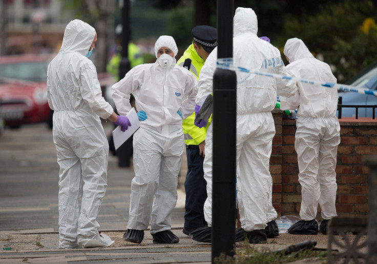 Forensic investigators at scene where machete killer attacked three people and beheaded Palmira Silva