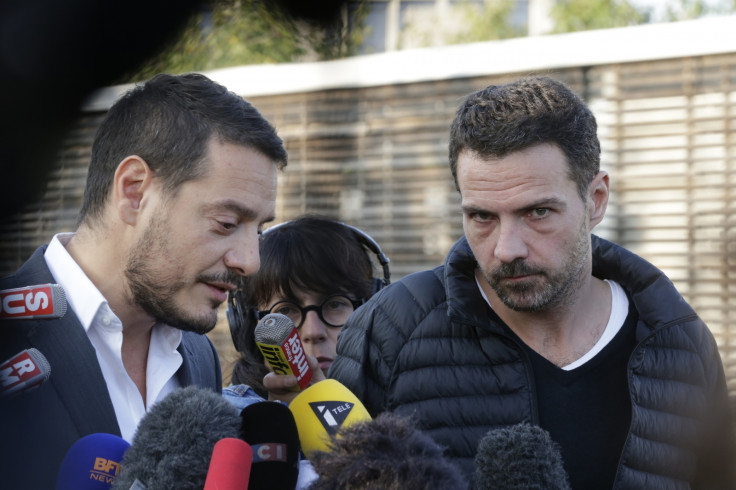 Former French trader Jerome Kerviel (R) and his lawyer David Koubbi speak to the media outside the Fleury-Merogis prison near Paris September 8, 2014.