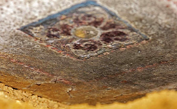 Painted marble tile embedded into the roof of the Greek tomb in Amphipolis