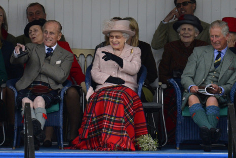 Prince Philip (L), Queen Elizabeth (C) and Prince Charles (R) at the Braemar Gathering in Scotland