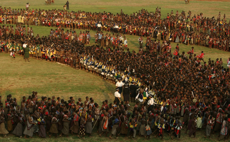 Bare-breasted virgins competing for King Mswati III's eye take part in a traditional Reed Dance at Ludzidzini, the royal palace in Swaziland August 31, 2008.