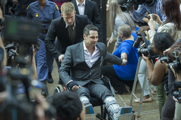 Carl Pistorius, the brother of Oscar, arrives at court in a wheelchair