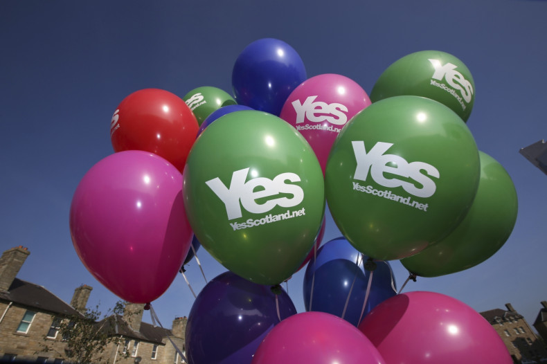A bunch of 'Yes' balloons are seen as Scotland's First Minister Alex Salmond campaigns in Edinburgh, Scotland September 10, 2014