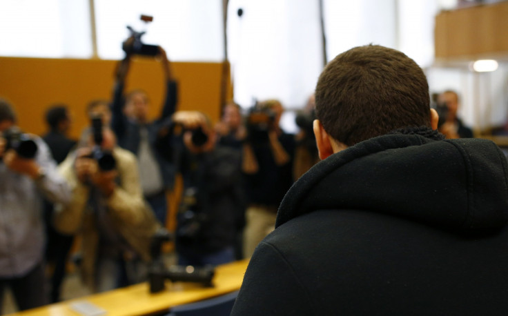 Defendant Kreshnik B., waits for the start of his trial in a courtroom in Frankfurt