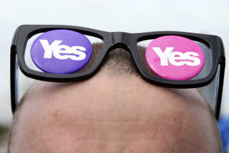 A 'Yes' supporter with 'Yes' spectacles is seen at a rally outside the BBC in Glasgow, Scotland September 14, 2014.