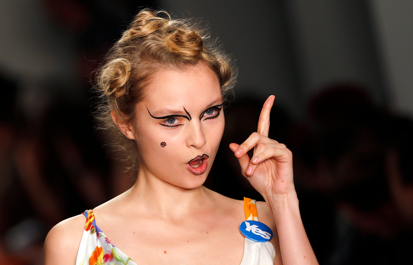 Vivienne Westwood London Fashion Week model wears Yes badge