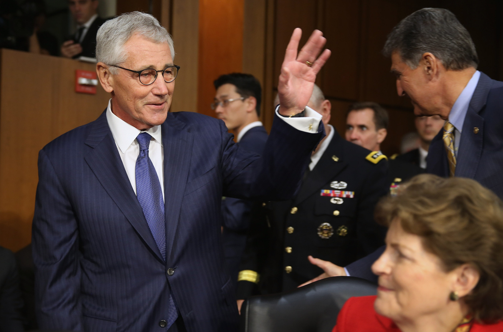 Chuck Hagel greets Senate Armed Services Committee