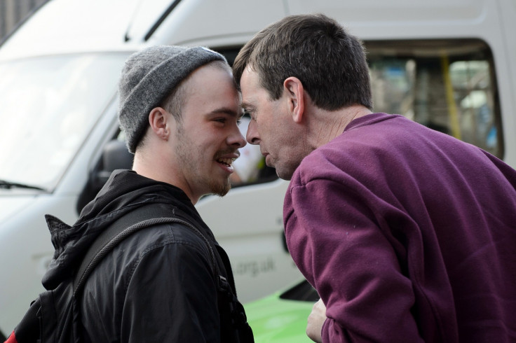 A 'yes' and a 'no' supporter debate the Scottish independence issue in Glasgow's George Square