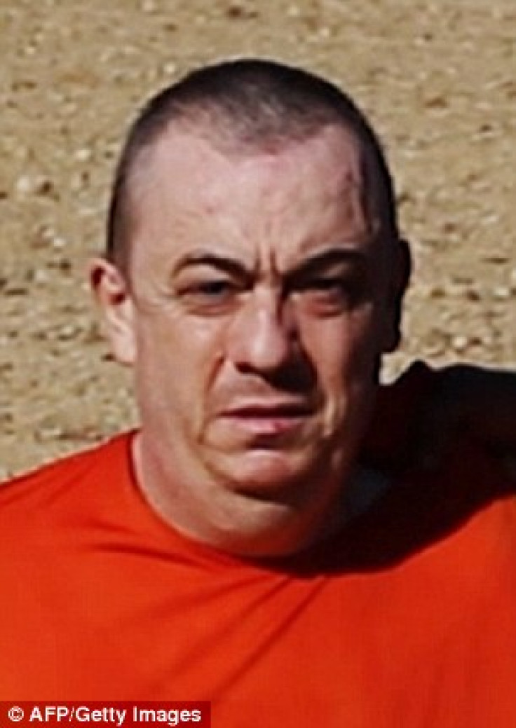 Alan Henning knells in Isis video threatening his death at hands of muslim fanatics