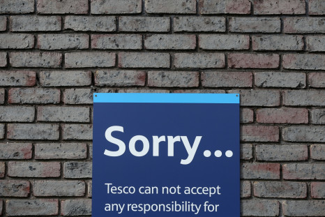 A sign is seen on the wall of a Tesco building in Bow, east London August 29, 2014.