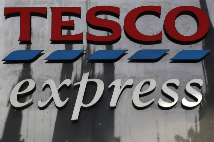 Tesco suspended 4 people after it revealed it overstated its profit by by £250m Tesco suspended 4 people after it revealed it overstated its profit by by £250m