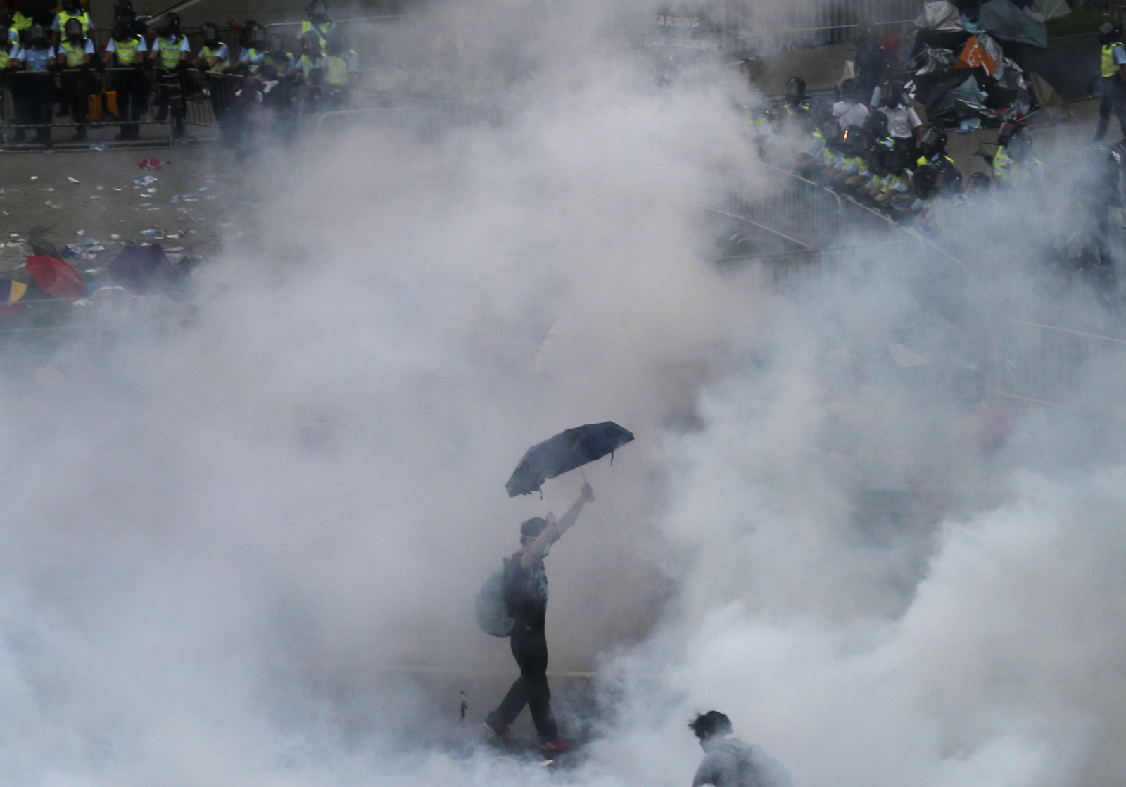 Hong Kong Occupy Central protestor in tear gas