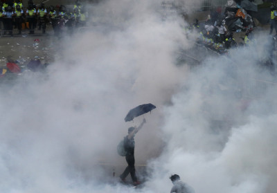 Hong Kong Occupy Central protestor in tear gas Hong Kong Occupy Central protestor in tear gas