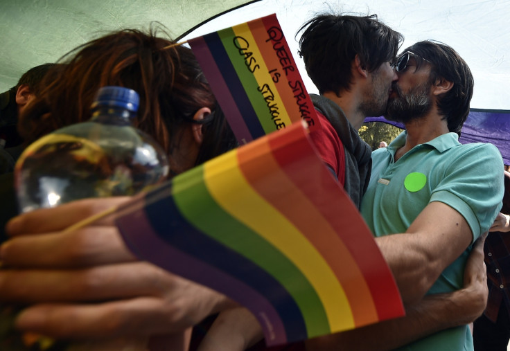 A couple kiss at Pride Belgrade, 2014.