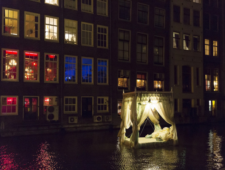 "Pas Encore Mon Histoire" by Vincent Olinet from France is pictured in the Red Light District as part of the Amsterdam Light Festival in Amsterdam December 6, 2013