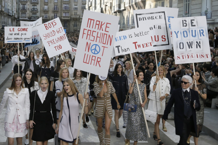 German designer Karl Lagerfeld with models staging a 'demonstration' during Paris Fashion Week