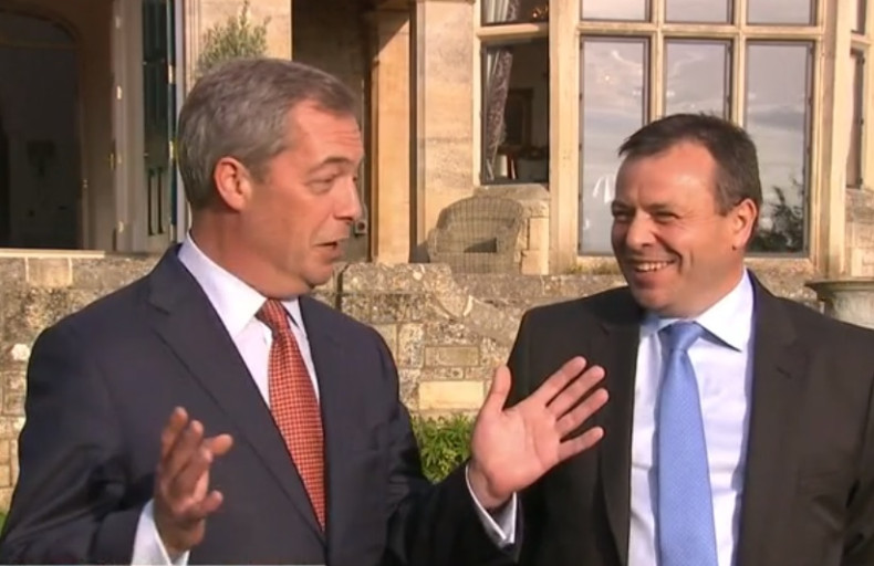 Arron Banks (left) with Ukip leader Nigel Farage as the millionaire announced he has defected from the Conservative party