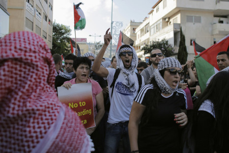 Israeli Arabs take part in a protest in the northern city of Nazareth, against Israel's offensive in the Gaza Strip July 21, 2014.