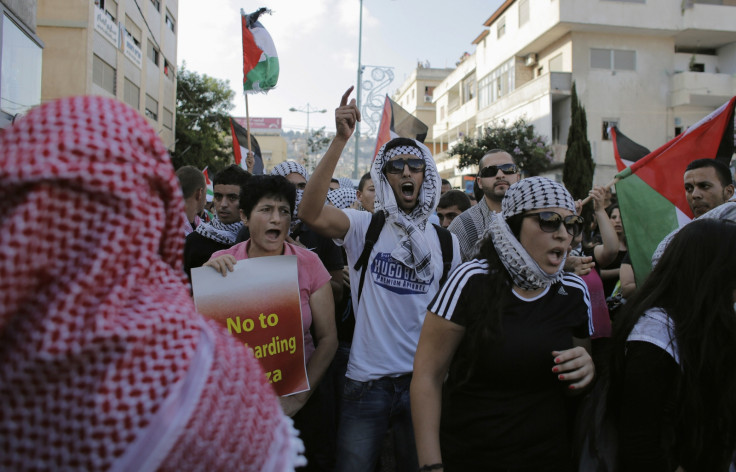 Israeli Arabs take part in a protest in the northern city of Nazareth, against Israel's offensive in the Gaza Strip July 21, 2014.