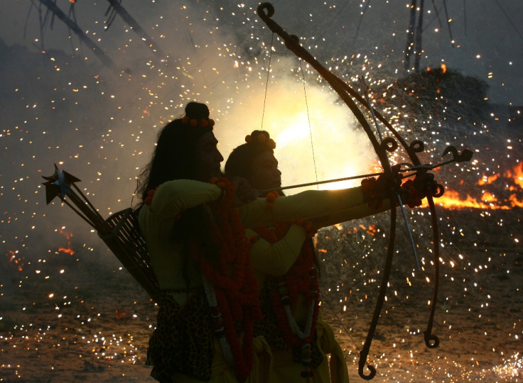 Artists dressed as Hindu Gods Rama and Laxman while performing the Ramlila