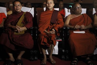 Buddhist monk Ashin Wirathu (C), leader of the 969 movement, looks on as he attends a convention held by the Bodu Bala Sena (Buddhist Power Force, BBS) in Colombo