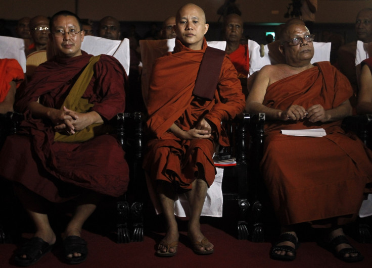 Buddhist monk Ashin Wirathu (C), leader of the 969 movement, looks on as he attends a convention held by the Bodu Bala Sena (Buddhist Power Force, BBS) in Colombo