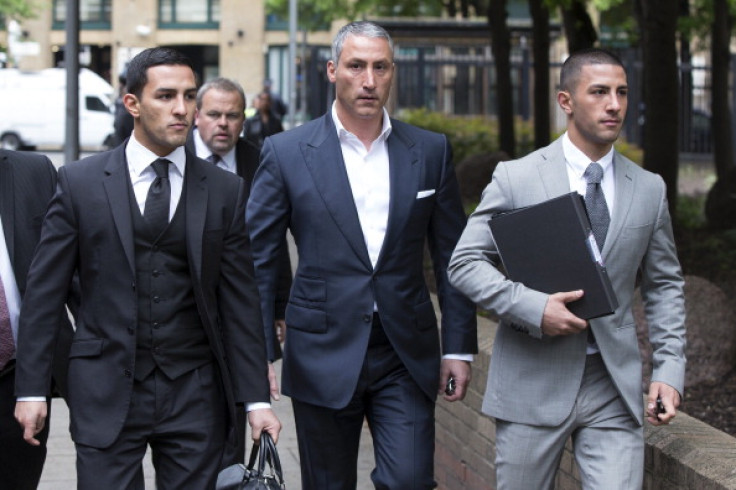 Millionaire property tycoon Andreas Panayiotou (C) with his sons George Panayiotou (R) and Costas Panayiotou.