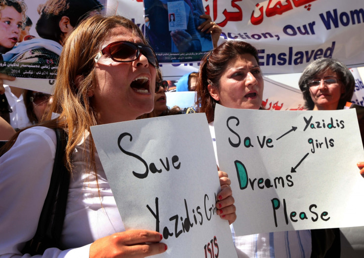 Iraqi Kurdish protesters denounce the Islamic State (IS) threat to Yazidi women and girls during a demonstration