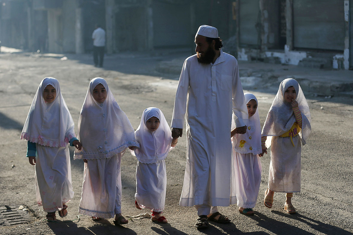 Eid al-Adha 2014: Photos of Muslims Around the World 