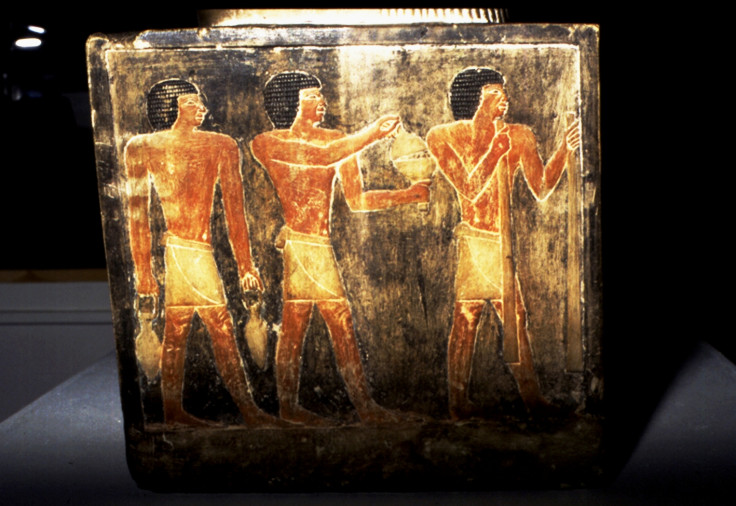 The Sekhemka statue's base, which depicts ancient Egyptians carrying wine, bread and cake for the scribe's afterlife