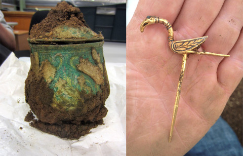 Viking treasure hoard: A silver alloy Carolingian vessel filled with objects and a gold bird hair decoration