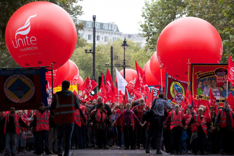 Protesters march through central London today, demanding pay hikes for public sector workers. (Getty)