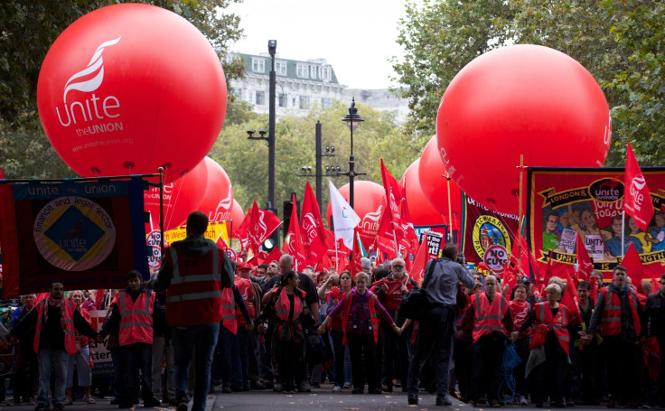 Protesters march through central London today, demanding pay hikes for public sector workers. (Getty)
