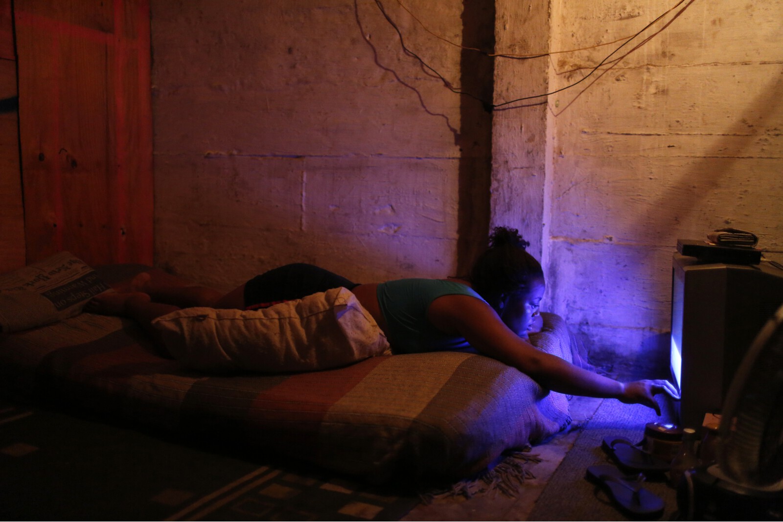Brazil Factory Slum Woman Watching Television