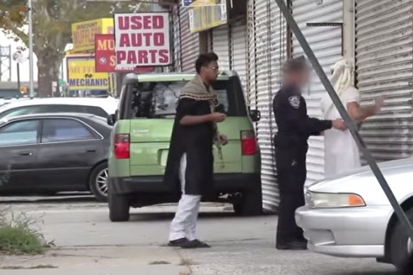 New York Police Officer Frisks Man in Muslim Dress