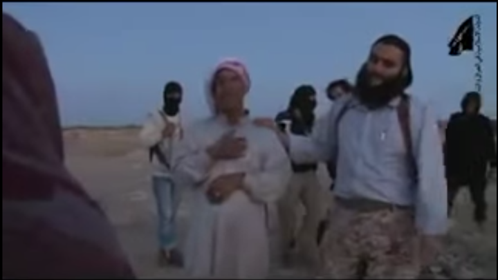 Still picture from graphic video showing woman stoned by death for adultery Still picture from graphic video showing woman stoned by death for adultery